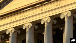 FILE - The U.S. Treasury Department is seen in Washington, Jan. 18, 2023. The Treasury and State departments imposed sanctions on nearly 400 entities and people on Oct. 30, 2024, as Washington seeks to curb Russia's evasion of sanctions imposed after its 2022 invasion of Ukraine.