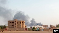 Smoke billows in the distance around the Khartoum Bahri district amid ongoing fighting in Sudan on July 14, 2023. 