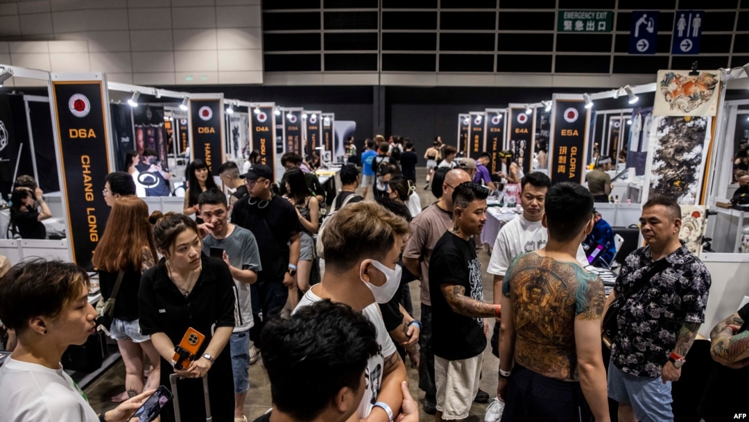 People attend the 7th Hong Kong China International Tattoo Convention in Hong Kong, Aug. 25, 2023. There are hundreds of tattoo studios in the city, and with the Year of the Dragon fast approaching, dragons are in demand.