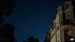 Stars are seen in the sky during a brief blackout in Odesa, Ukraine, July 24, 2023. In just a week, Russia has fired more than 125 missiles and drones at the Odesa region, hitting the city center that had been largely spared since the war began.