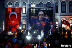 Supporters of Turkish President Tayyip Erdogan gather on the day of the second round of the presidential election in Istanbul, Turkey May 28, 2023.
