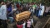 Uganda Begins Burying Victims of Brutal School Attack