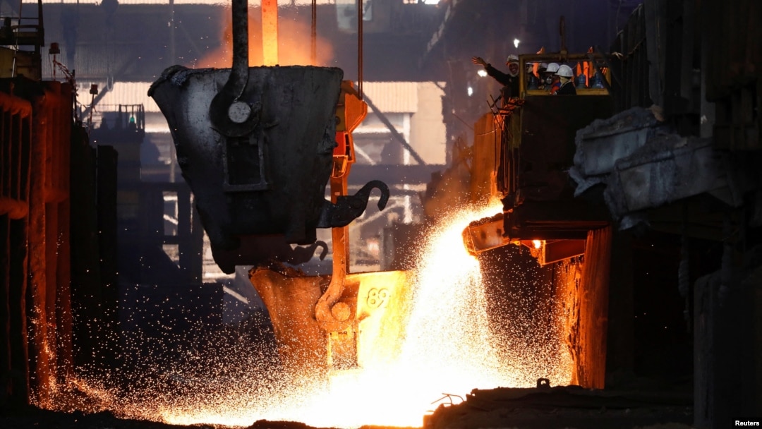 FILE - Workers monitor the nickel melting process at a nickel smelter of PT Vale Tbk in Sorowako, South Sulawesi province, Indonesia, March 30, 2023.