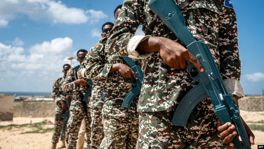 FILE - Troops take part in Somali army training in Mogadishu on March 19, 2024. Two government soldiers are among the 12 dead in fighting with local militias near the border with Ethiopia on July 16, 2024.