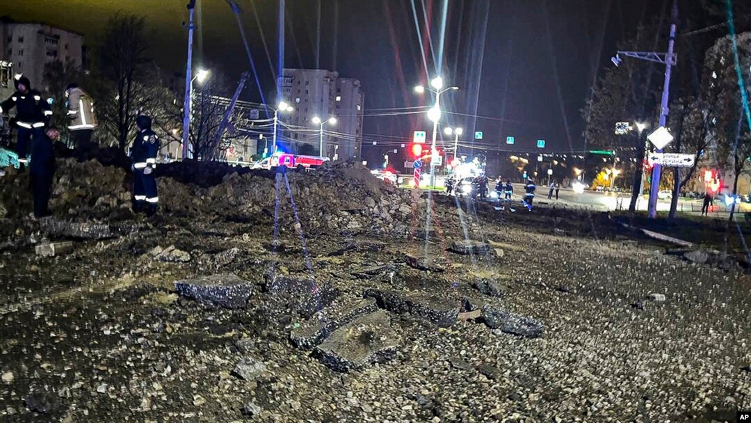 This handout photo released by Telegram Channel of Belgorod Region Governor Vyacheslav Gladkov shows the site of the crater after an explosion in Belgorod, Russia, April 21, 2023.
