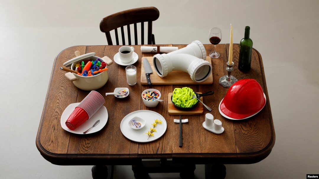 Various plastic goods weighing 3.15 kilograms, which is equivalent to the amount of plastic that someone could eat in ten years, are displayed on a table in this illustration taken in Tokyo, Japan, March 31, 2020. (REUTERS/Kim Kyung-Hoon/Illustration)