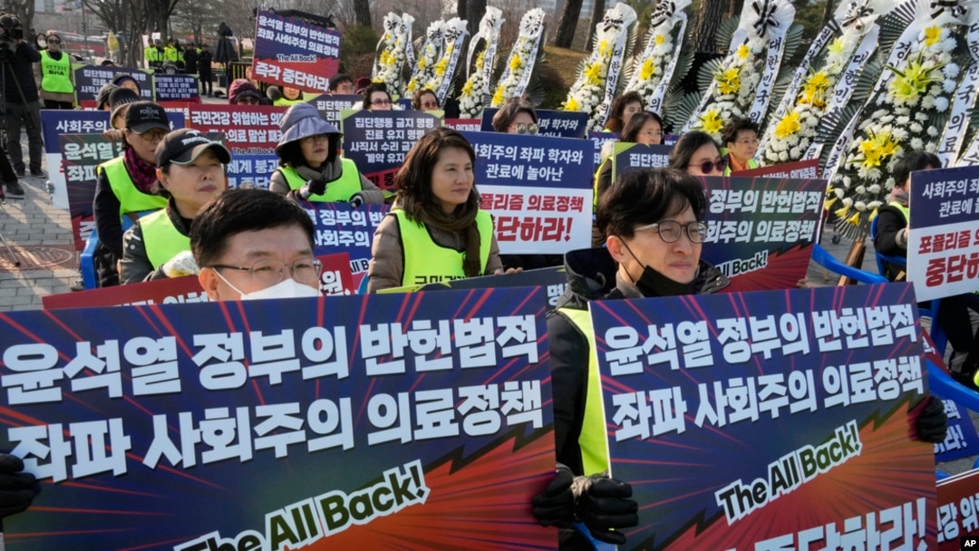 Members of the Gyeonggi Province Medical Association stage a rally against the government's medical policy near the presidential office in Seoul, South Korea, March 13, 2024. 