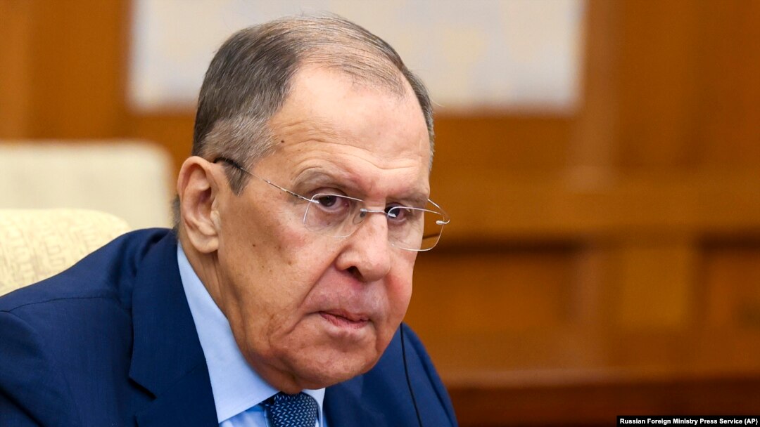 FILE — Russian Foreign Minister Sergey Lavrov talks with Chinese Foreign Minister Wang Yi in Beijing, China, Oct. 16, 2023. The foreign ministers of the three Baltic states and Ukraine pledge to boycott this week's OSCE meeting in North Macedonia to object Lavrov's participation.