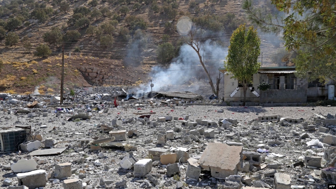FILE - A partial view shows the aftermath of Iranian cross-border attacks in the area of Zargwez, on Sept. 28, 2022. 