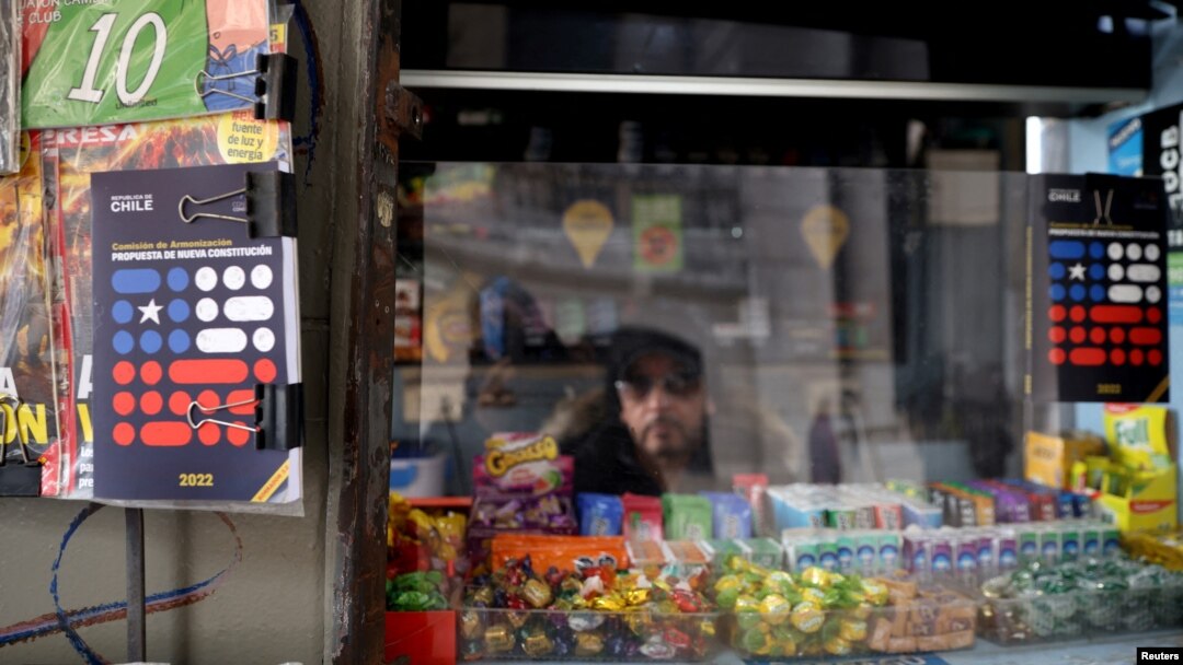 Books of proposed new constitution are displayed at a hawker's street stall at downtown Santiago, Chile July 14, 2022. (REUTERS/Ivan Alvarado)