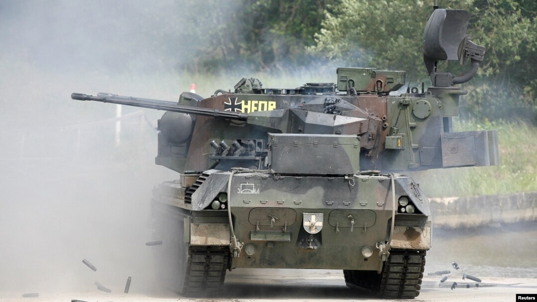 FILE - A German Gepard antiaircraft tank fires during a demonstration about 80 km south east of Hamburg, Germany, June 20, 2007. Germany will authorize the delivery of tanks to Ukraine, Defense Minister Christine Lambrecht said on April 26, 2022.