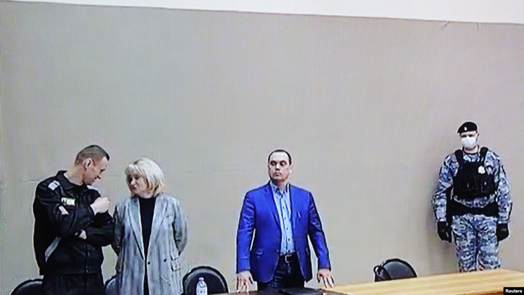 Russian opposition leader Alexei Navalny (left) during a court hearing at the IK-2 corrective penal colony in the town of Pokrov in Vladimir Region, Russia March 22, 2022. 
