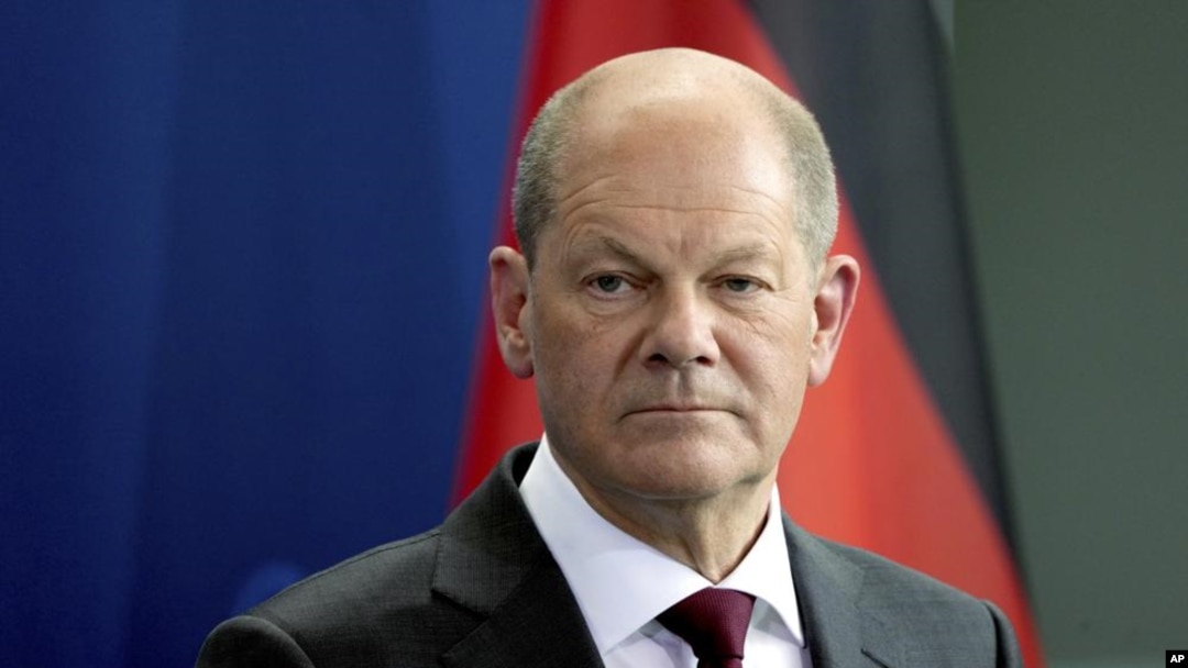 German Chancellor Olaf Scholz attends a joint press conference after a meeting with the Emir of Qatar, Sheikh Tamim bin Hamad Al Thani, at the chancellery in Berlin, Germany, Friday, May 20, 2022. (AP Photo/Michael Sohn)