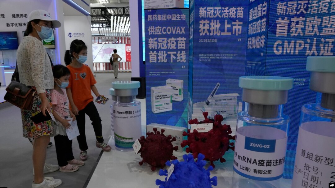 More than two years into the pandemic, China has not approved the more effective mRNA vaccines, instead choosing to pursue its own route on COVID-19 vaccines. (AP Photo/Ng Han Guan)