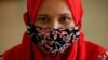 Una mujer lleva un tapabocas en Yakarta, Indonesia, el 1 de julio de 2020. REUTERS/Willy Kurniawan