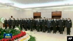 中共前領導人胡錦濤在江澤民追悼儀式上露面。（2022年12月6日）