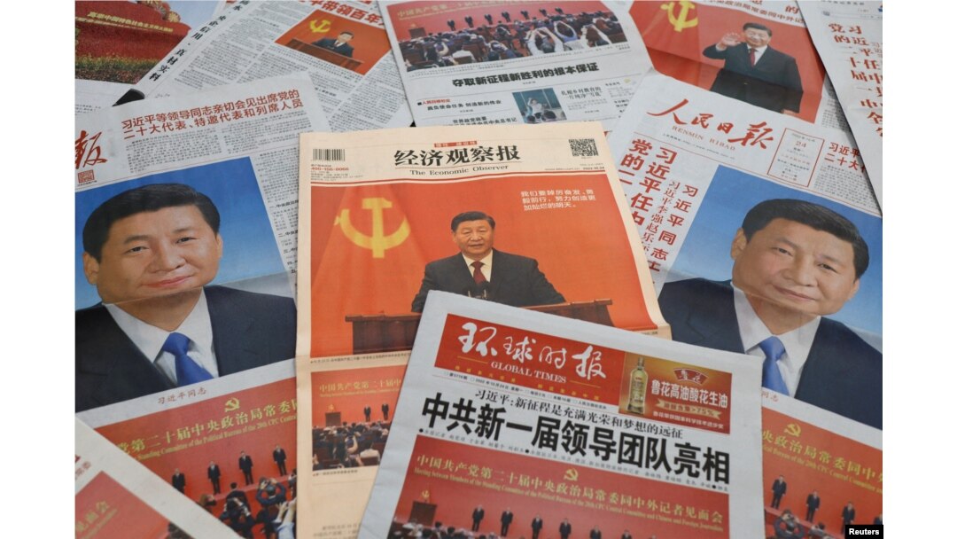 Newspaper reports on the new Politburo Standing Committee led by Chinese President Xi Jinping, following the 20th National Congress of the Communist Party of China, are seen in this illustration picture taken Oct. 24, 2022.