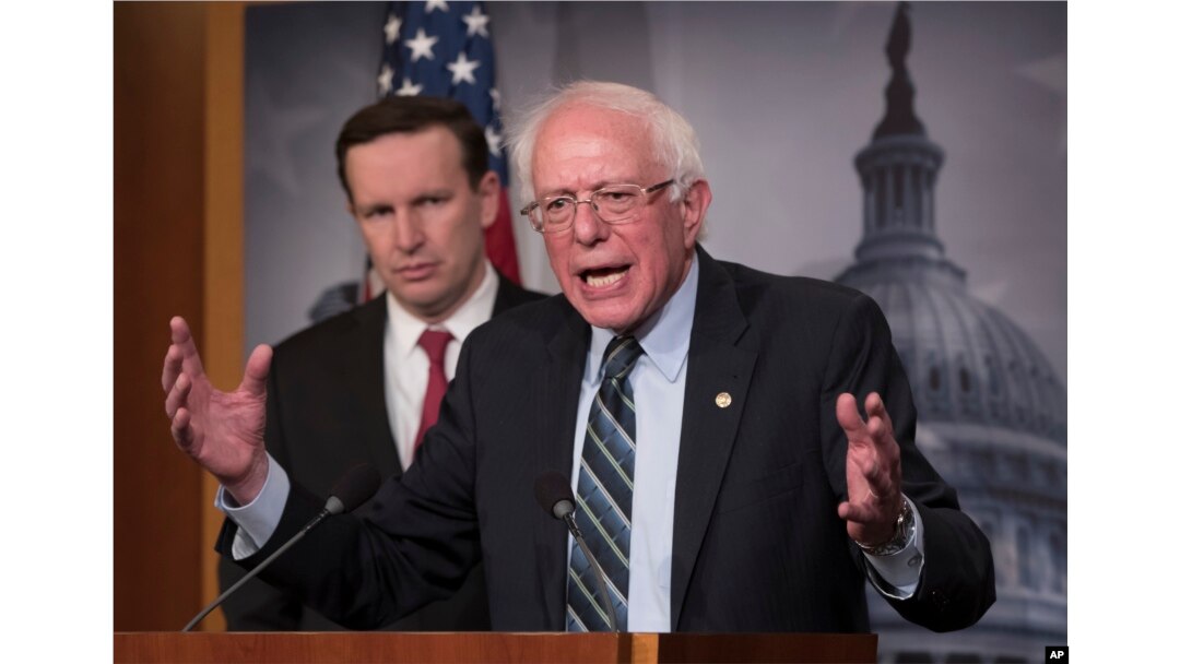 FILE - Sen. Bernie Sanders, I-Vt., joined by Sen. Chris Murphy, D-Conn., holds a news conference after the Senate passed a resolution he introduced that would pull assistance from the Saudi-led war in Yemen, Dec. 13, 2018.