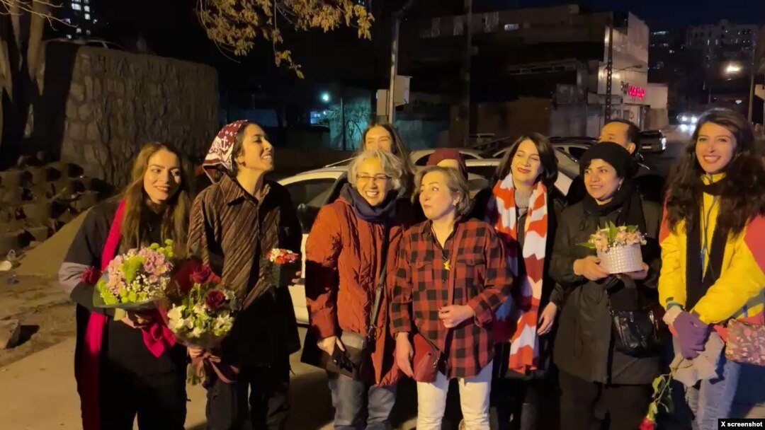 A screenshot from a video posted on the Twitter page of Iranian photographer Alieh Motalebzadeh shows the prisoners whose release from Tehran's Evin prison was announced on Feb. 9, 2023. 