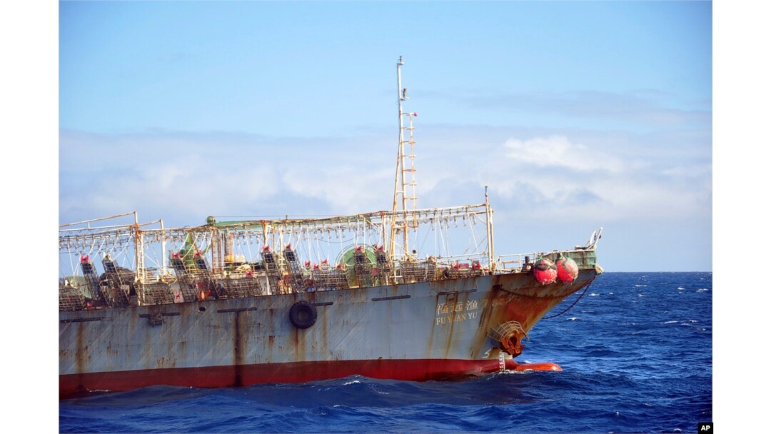 FILE - The Chinese squid fishing vessel 'Fu Yuan Yu 7880' sails on the Pacific Ocean on July 18, 2021. The Pingtan-affiliated vessel was arrested by South Africa in 2016 after it tried to flee a naval patrol that suspected it of illegal squid fishing.