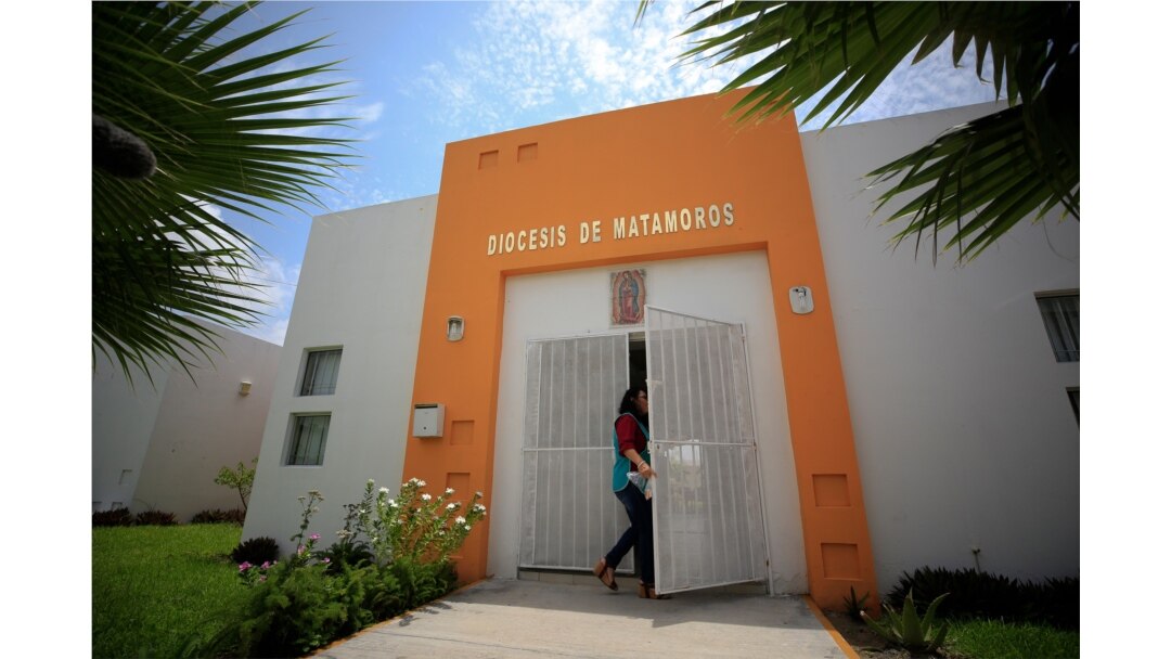 A worker enters the migrant shelter where Tania Vanessa Avalos has been receiving assistance since her husband and their daughter drowned Sunday when the family tried to cross the Rio Grande in Matamoros, Tamaulipas state, Mexico, June 26, 2019.