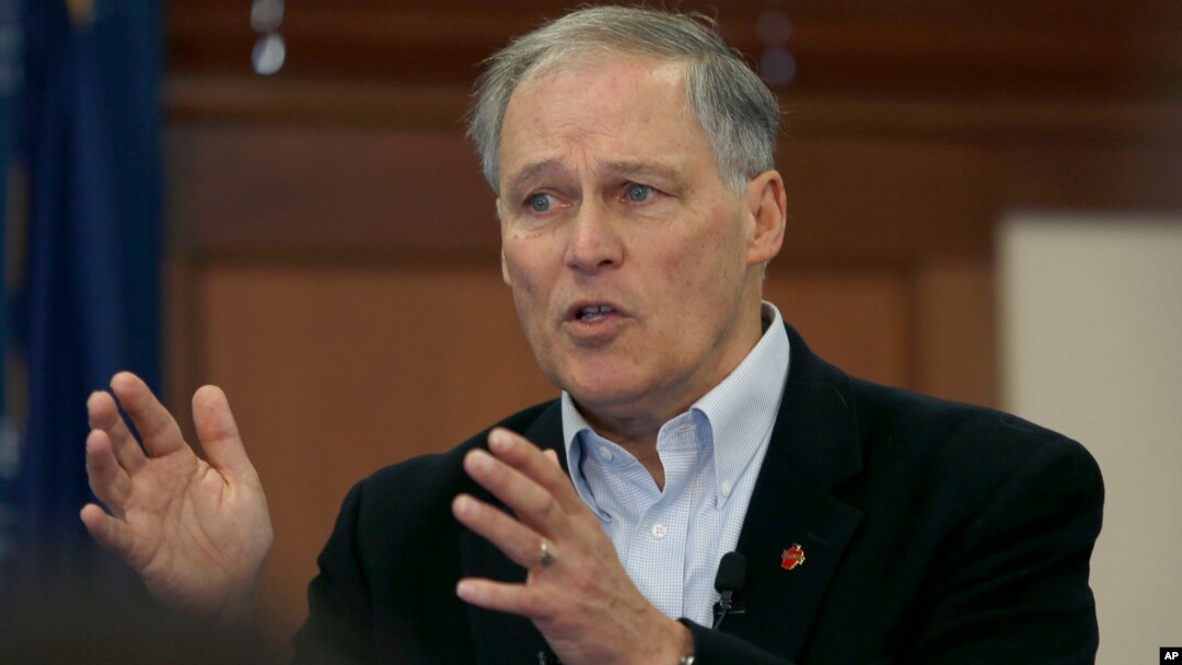 FILE - Washington Gov. Jay Inslee speaks to students at Saint Anselm College in Manchester, N.H., Jan. 22, 2019.