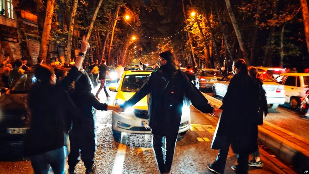 FILE - Women in Tehran, Iran, protest the death of Mahsa Amini in this Oct. 1, 2022, photo taken by an individual not employed by the Associated Press and obtained by the AP outside Iran.
