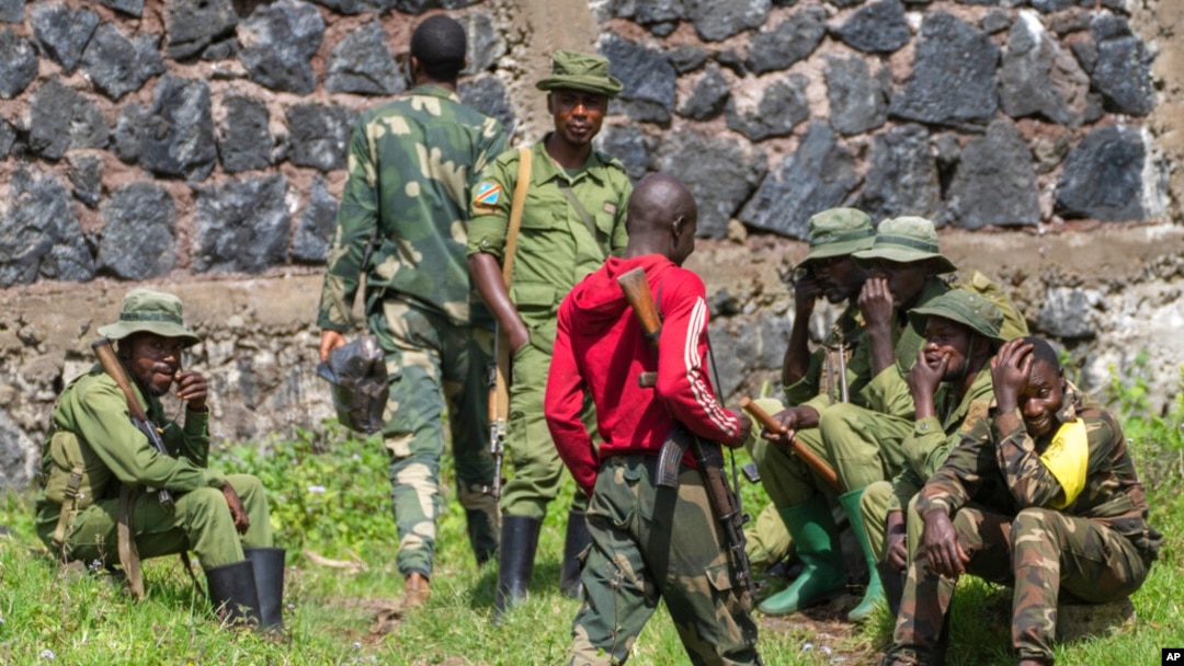 Members of the armed forces of the Democratic Republic of the Congo are pictured at a checkpoint north of Goma, Nov. 25, 2022. M23 rebels were still fighting and advancing on one front of their offensive in eastern DRC on Friday as a cease-fire came into force.
