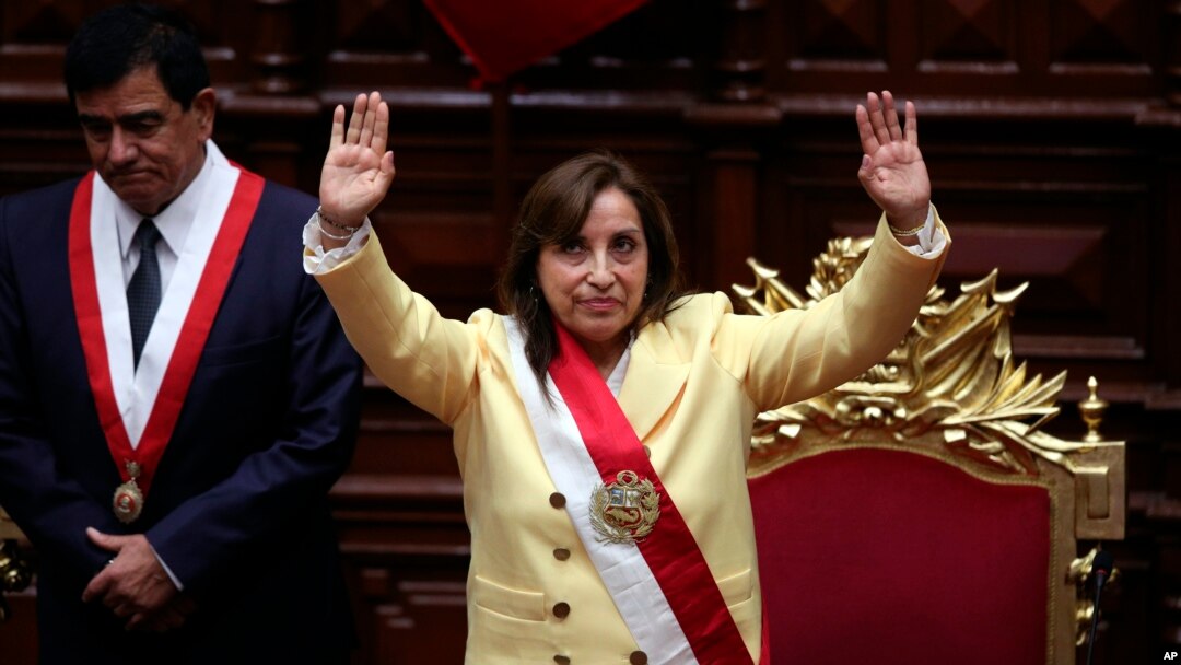 Former Vice President Dina Boluarte acknowledges lawmakers after she was sworn in as president in Lima, Peru, Dec. 7, 2022. She replaces Pedro Castillo, who was ousted by Congress after seeking to dissolve the legislative body and take unilateral control of the government.