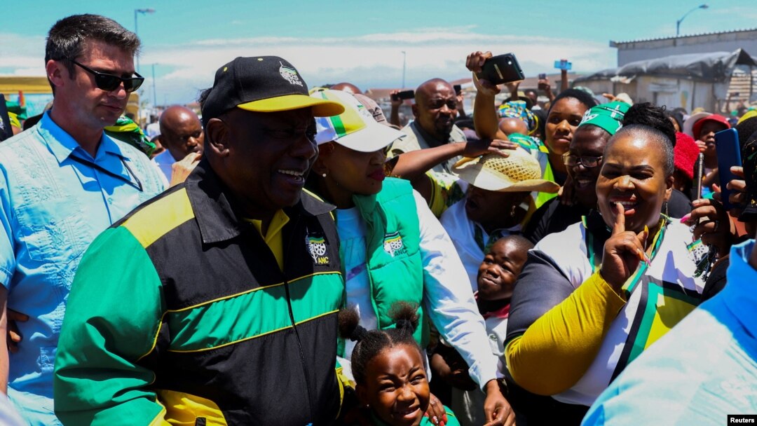FILE - South African President Cyril Ramaphosa holds meet and greet with Philippi residents on the Cape Flats, a week before the African National Congress holds its national conference in Cape Town, Dec. 10, 2022. 