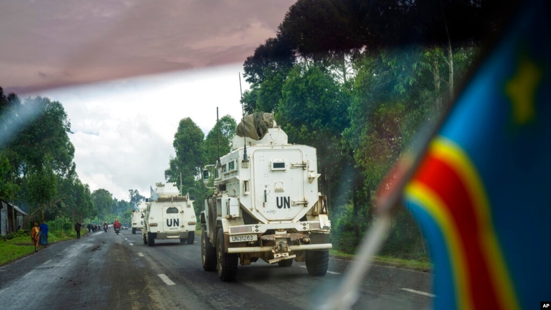 U.N. vehicles patrol the road leading to the front line in Goma, Democratic Republic of the Congo, Nov. 25, 2022.