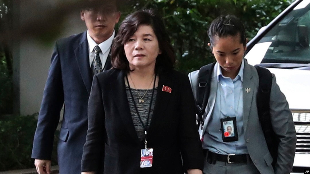 FILE - North Korean Vice Foreign Minister Choe Son Hui, center, arrives for a meeting with US Ambassador to the Philippines Sung Kim at the Ritz-Carlton Millenia Hotel in Singapore, June 11, 2018, ahead of the summit between U.S. President Donald Trump an