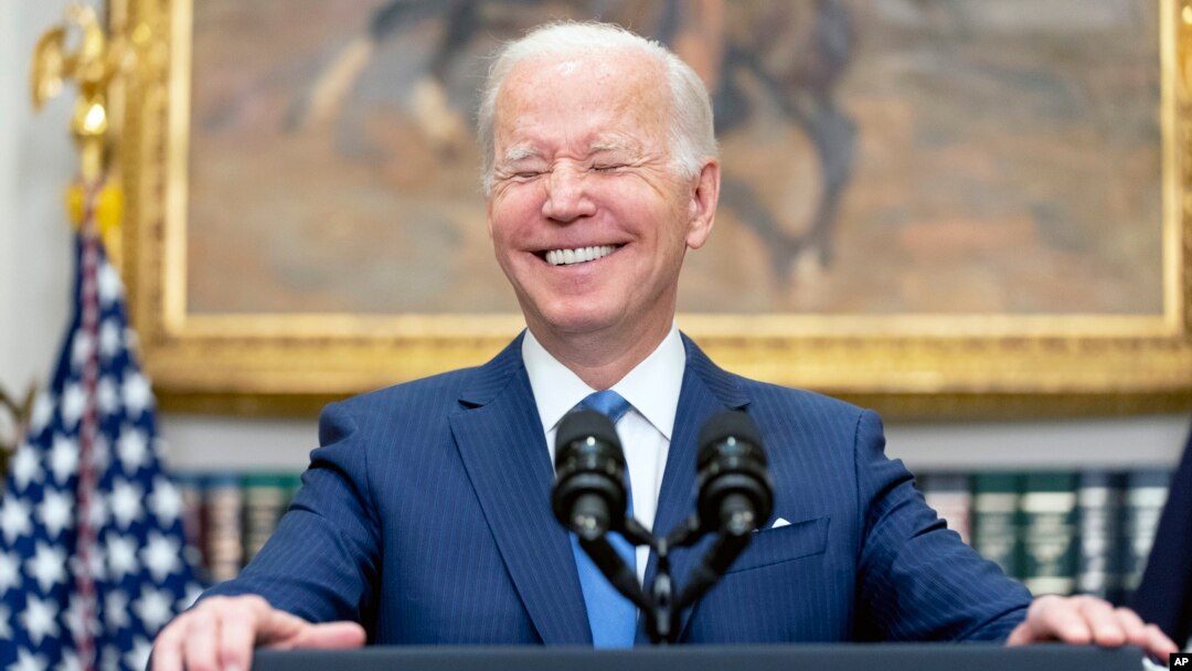 FILE - President Joe Biden smiles while speaking in the Roosevelt Room at the White House, April 28, 2022, in Washington. The White House Correspondents’ Association dinner returns Saturday night after a hiatus due to the COVID pandemic.
