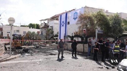 Israel, Hezbollah trade rocket fire and threats