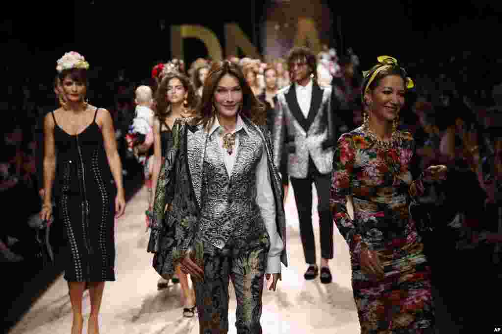 Model Carla Bruni Sarkozy, center, and other models present creations during the Dolce & Gabbana fashion show, as part of the Women's Spring/Summer 2019 fashion week in Milan, Italy.