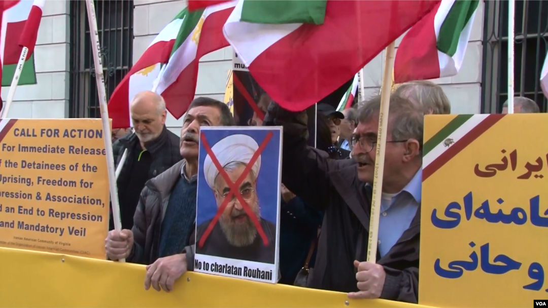 Iranian American protesters chant "Death to Khamenei" and "Death to Rouhani" as Iran's foreign minister Mohammad Javad Zarif appears at the Council on Foreign Relations in New York, April 23, 2018.