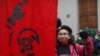 Manifestantes marchan por Santiago de Chile el 11 de septiembre de 2022 para conmemorar el 49 aniversario del golpe de Estado del general Augusto Pinochet. 