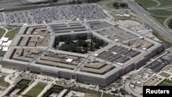 FILE - An aerial view of the Pentagon building in Washington, June 15, 2005. 