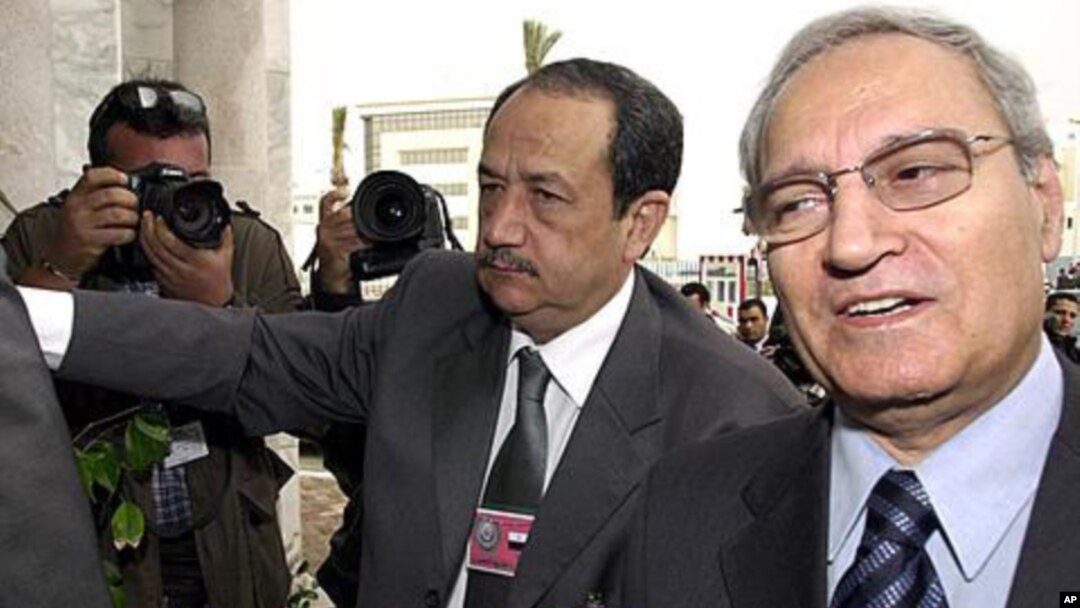 Syrian Vice President Farouk al-Sharaa, right (file photo)