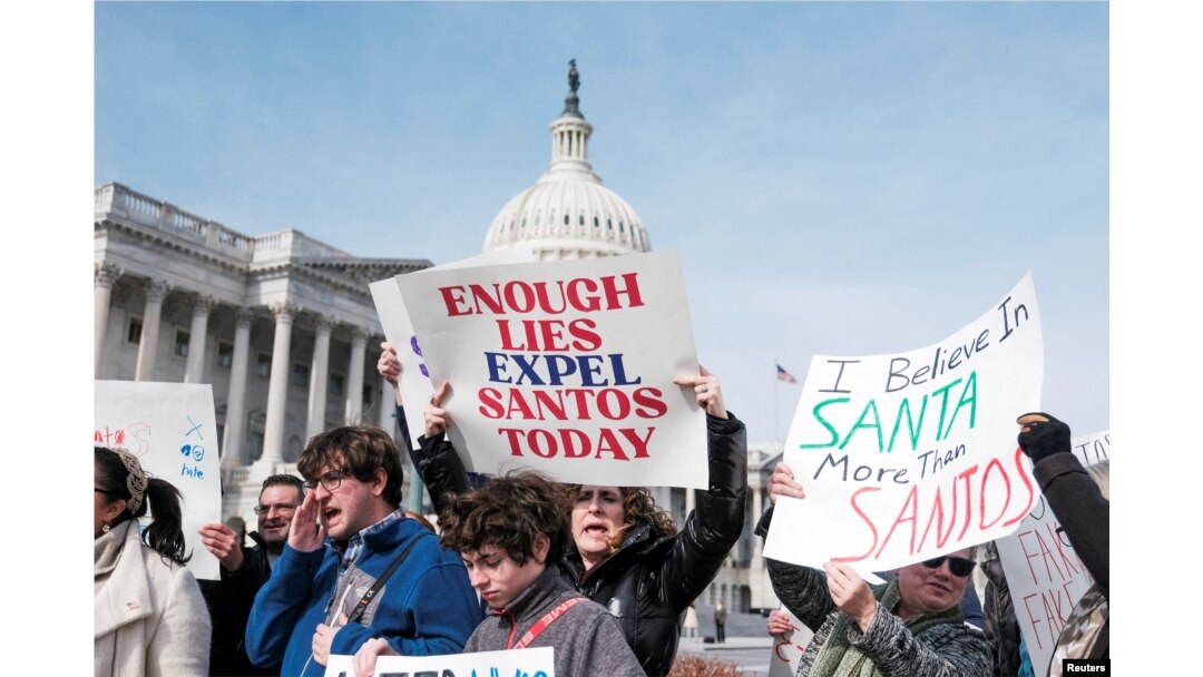 FILE - A group of Rep. George Santos's constituents from New York's 3rd Congressional District holds news conference and petition drive calling for Santos’s resignation on Capitol Hill in Washington.