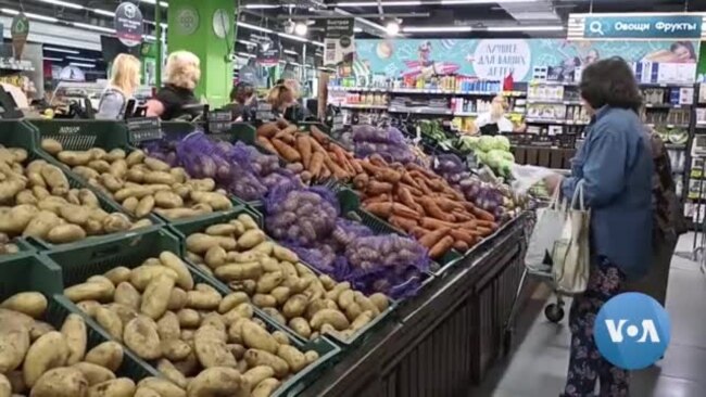 As Sanctions Bite, Russians Seem Worried – and Skeptical