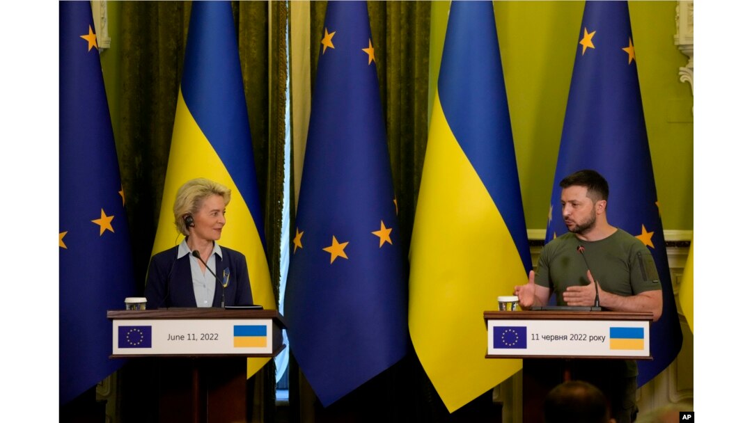 FILE - Ukraine President Volodymyr Zelenskyy speaks during a joint press conference with European Commission President Ursula von der Leyen, left, in Kyiv, Ukraine, June 11, 2022.