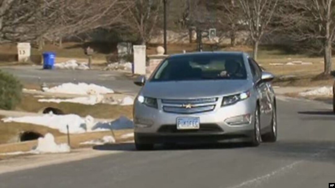 Lawyer Jeff Parmet, behind the wheel of his Volt, says he hasn't pumped gas since buying the electric car in December.