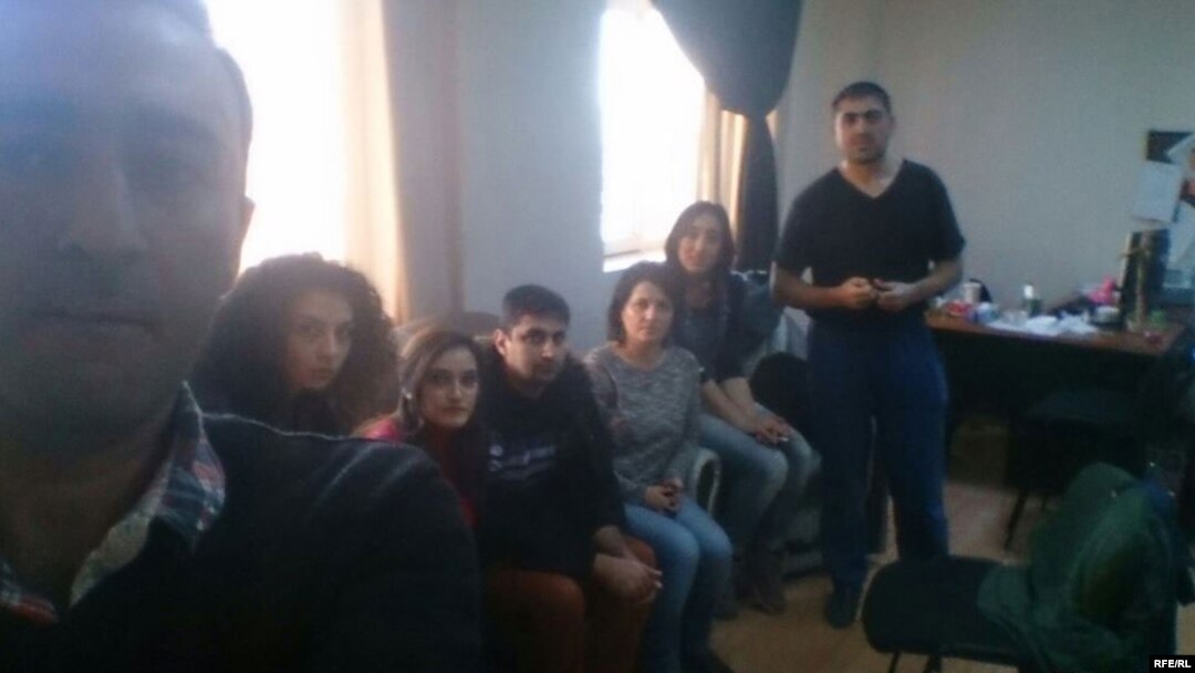 Staff from RFE/RL's Azerbaijani Service were held in their Baku offices by state prosecutors, who said they had a court order to close the bureau down. 