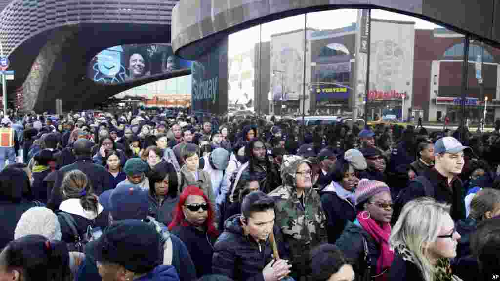 Commuters wait in Brooklyn, New York to board buses into Manhattan, due to the widespread subway closures throughout the city.