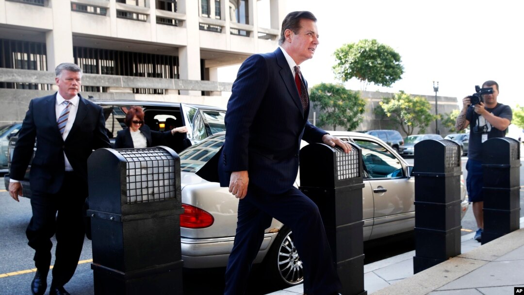 FILE - Paul Manafort arrives at federal court, June 15, 2018, in Washington.