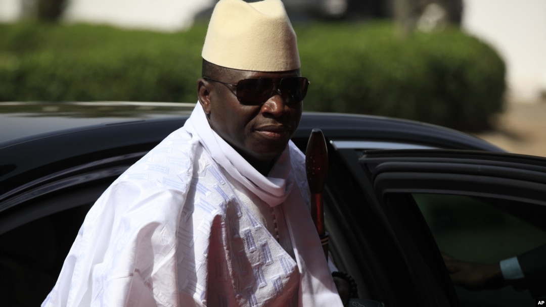FILE - Gambia's President Yahya Jammeh arrives for a summit to address a seminar on security during an event marking the centenary of the unification of Nigeria's north and south in Abuja, Nigeria.