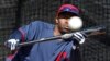 Cleveland Indians&#39; Michael Bourn bunts during spring training baseball practice in Goodyear, Arizona, Feb. 24, 2014.