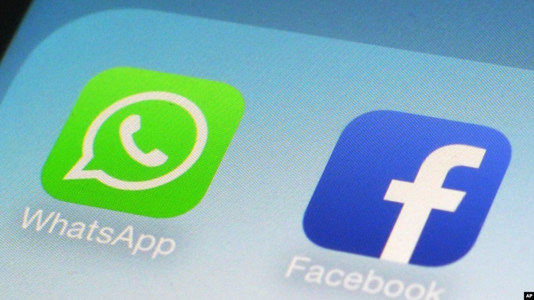 FILE - WhatsApp and Facebook app icons on a smartphone in New York. 