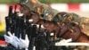 FILE - Military officers march during a parade to commemorate Myanmar's 78th Armed Forces Day in Naypyitaw, Myanmar, March 27, 2023. 